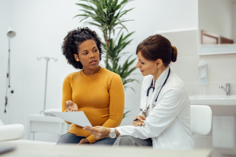 Doctor or Nurse consulting patient on the topic of endometriosis